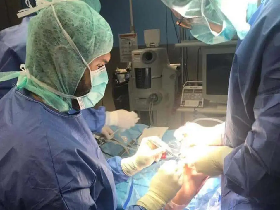 Knee surgery in a modern operating room